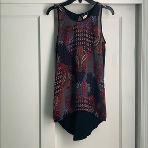 Sleeveless Paisley blouse w/ longer fishtail back